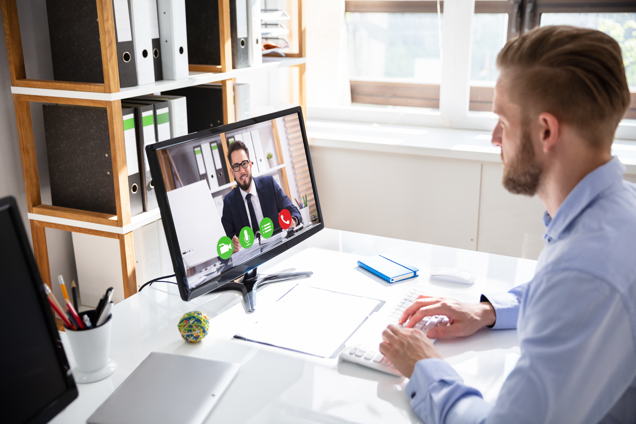 Businessman on a video or conference call on his computer