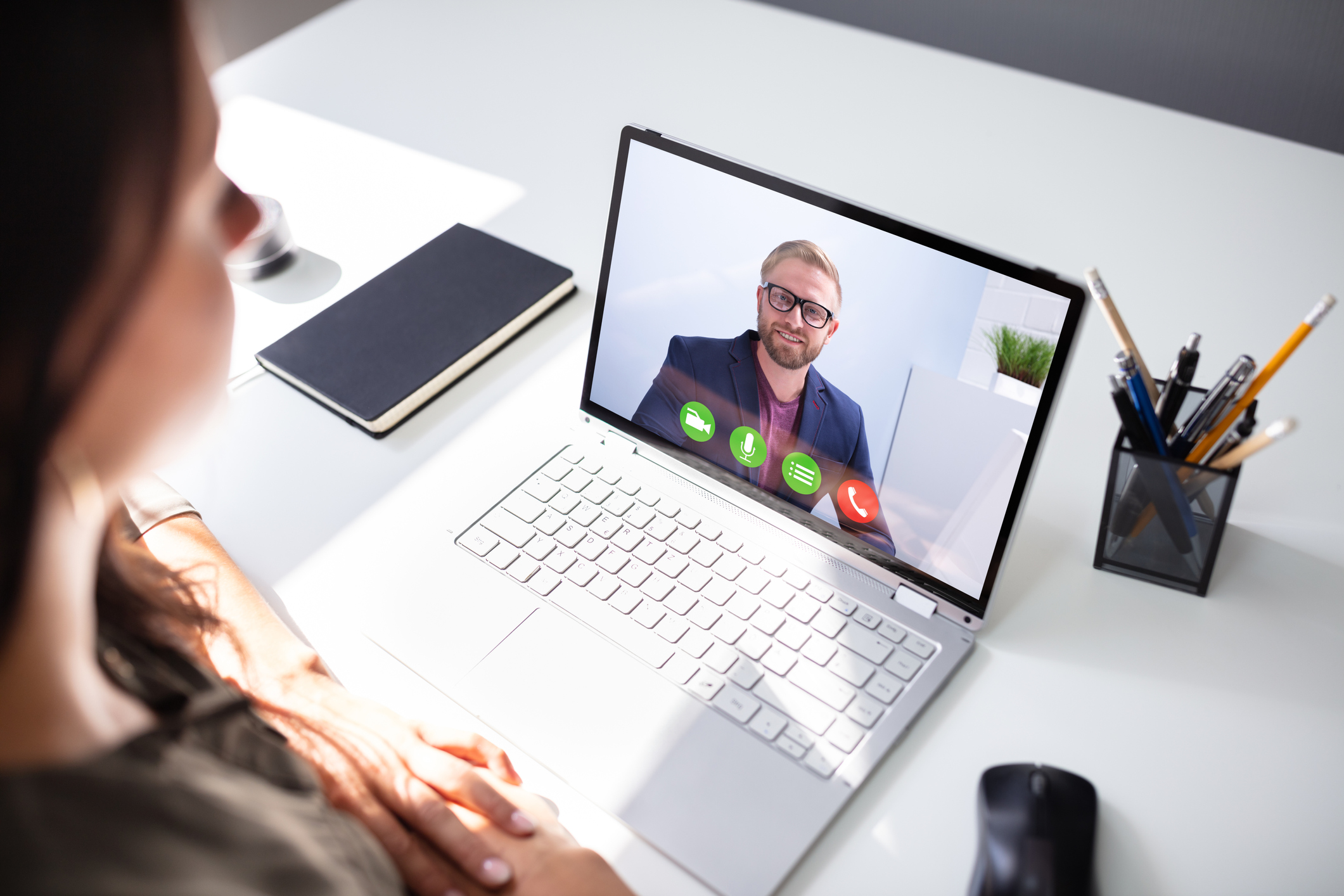 Businesswoman Video Conferencing With Coworker